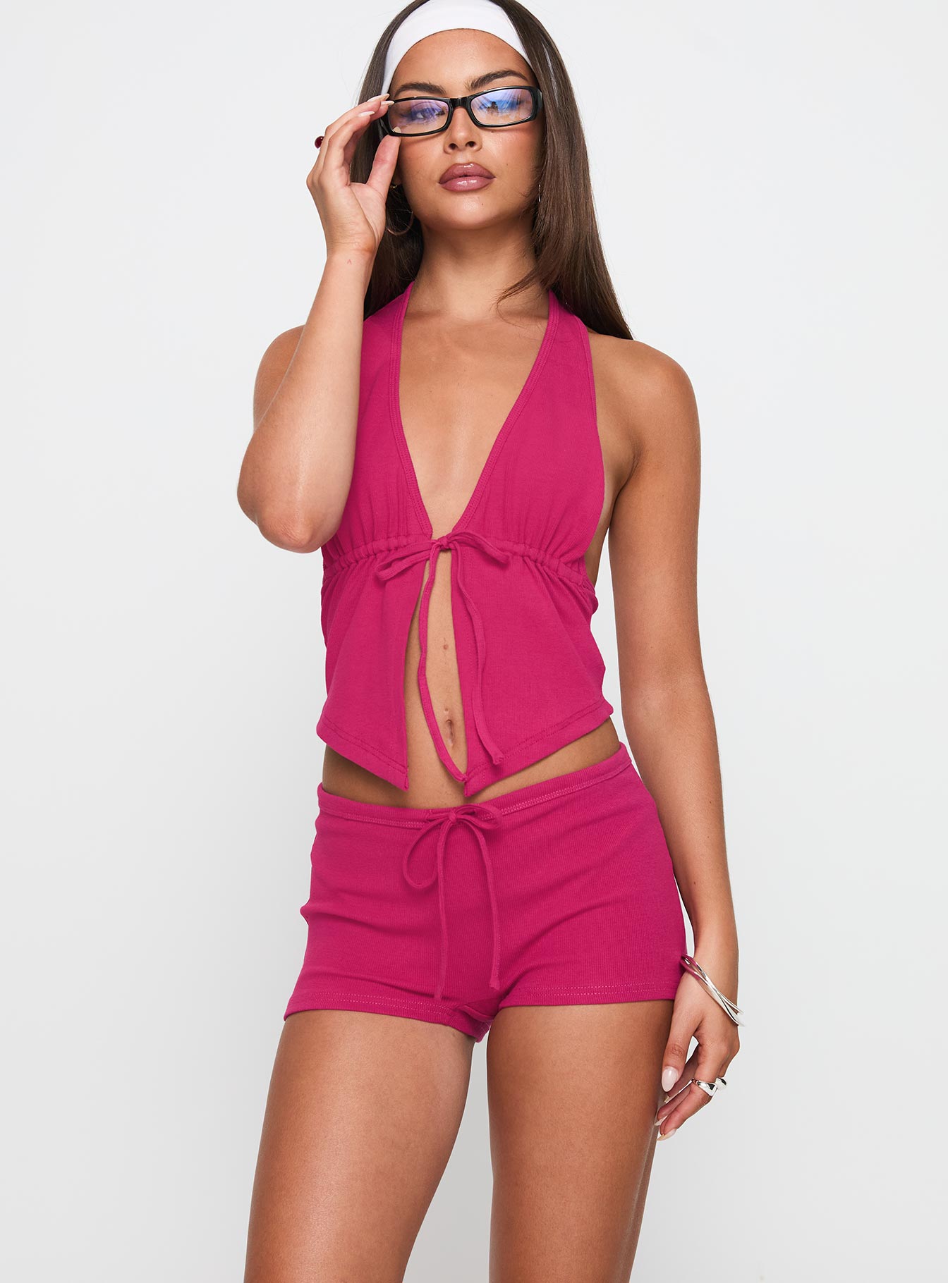 front view of model wearing Princess Polly Gracious Low Rise Mini Short Pink Low Rise Shorts 