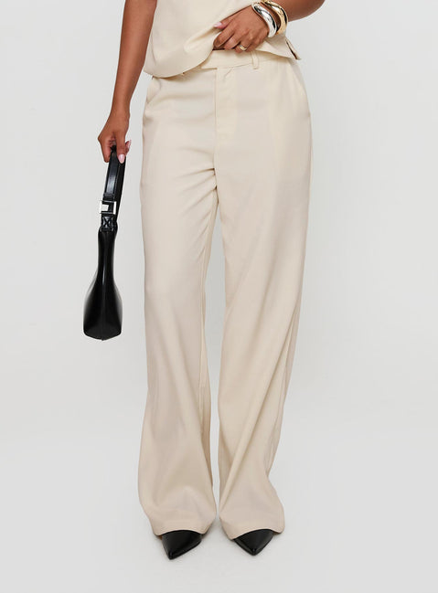 side view of model wearing Princess Polly Irresistible Wide Leg Pant Cream Petite High Waisted Pants 