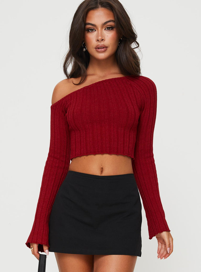 front view of model wearing Princess Polly Santorini Knit Top Red Full Sleeves Asymmetric Neckline 