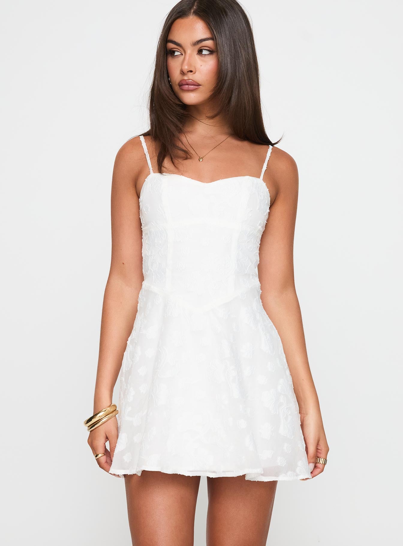 front view of model wearing Princess Polly New Chapters Broderie Mini Dress White Sweetheart Neckline 
