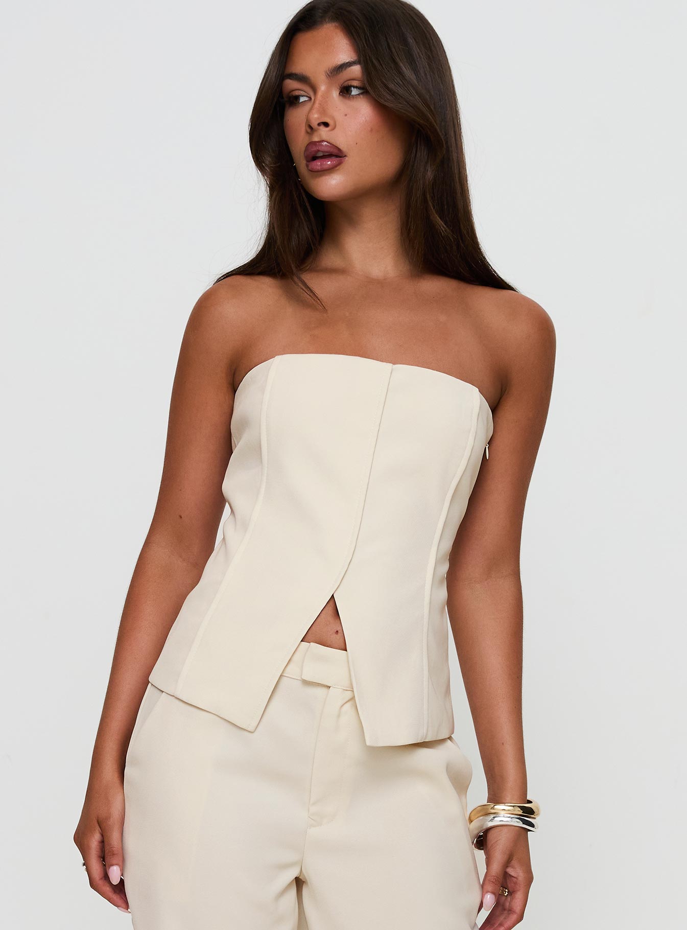 front view of model wearing Princess Polly Lavish Living Strapless Top Cream Sleeveless straight 