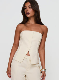 front view of model wearing Princess Polly Lavish Living Strapless Top Cream Sleeveless straight 