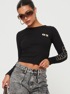 Front view of model wearing  front Princess Polly Full Sleeves High Neck  Larva 02 Long Sleeve Top Black