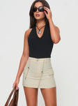 Front view of model wearing  front Torres Cargo Mini Skirt Beige Princess Polly  Mini Skirts 