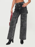 front view of model wearing Princess Polly Malachie High Rise Jeans Black Acid Wash Mid Rise 