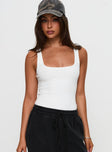 front view of model wearing Princess Polly Baseline Rib Bodysuit White Sleeveless 