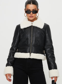 Jacket Faux leather, shearling material on inside and outside, classic collar, twin chest pockets, twin buckle detail at sides-adjustable Zip fastening at front