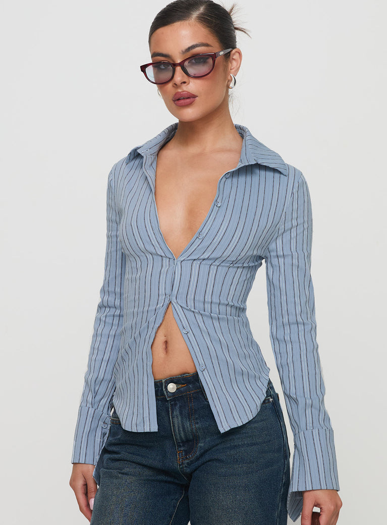 side view of model wearing Princess Polly Madlin Long Sleeve Top Blue Stripe Full Sleeves V-Neck 