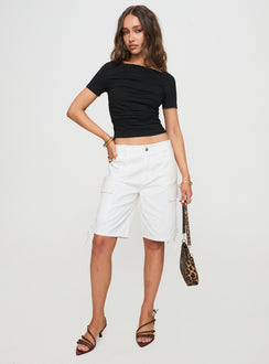 front view of model wearing Princess Polly Bleachers Shorts White High Waisted Shorts 