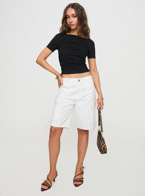 front view of model wearing Princess Polly Bleachers Shorts White High Waisted Shorts 