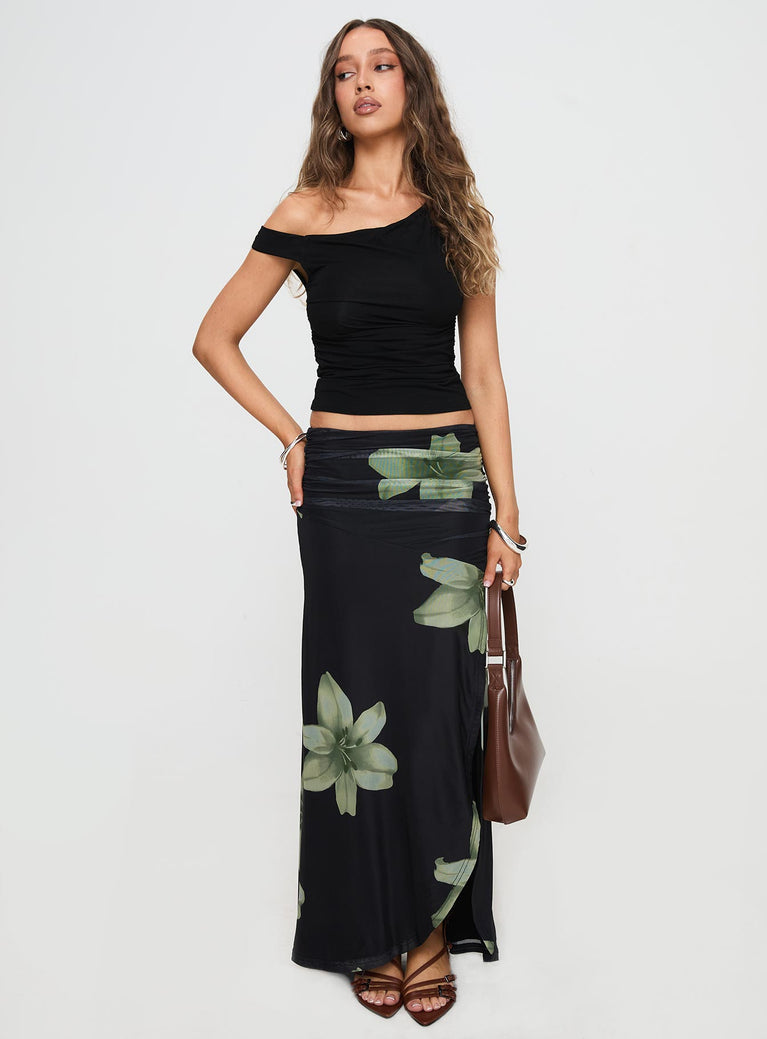   front view of model wearing Princess Polly Cooperi Maxi Skirt Black Floral Maxi 