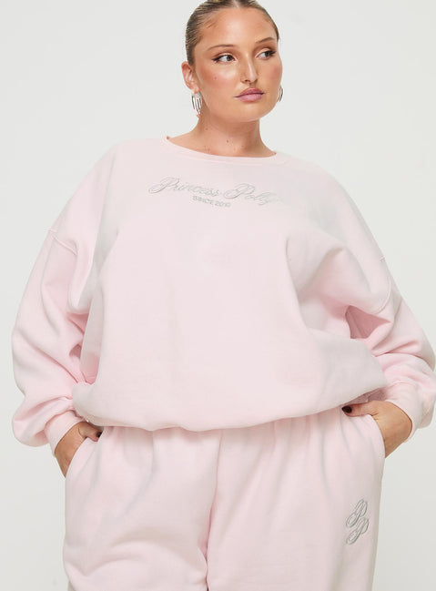 front view of model wearing Princess Polly Princess Polly Crew Neck Sweatshirt Script Baby Pink / Grey Curve 