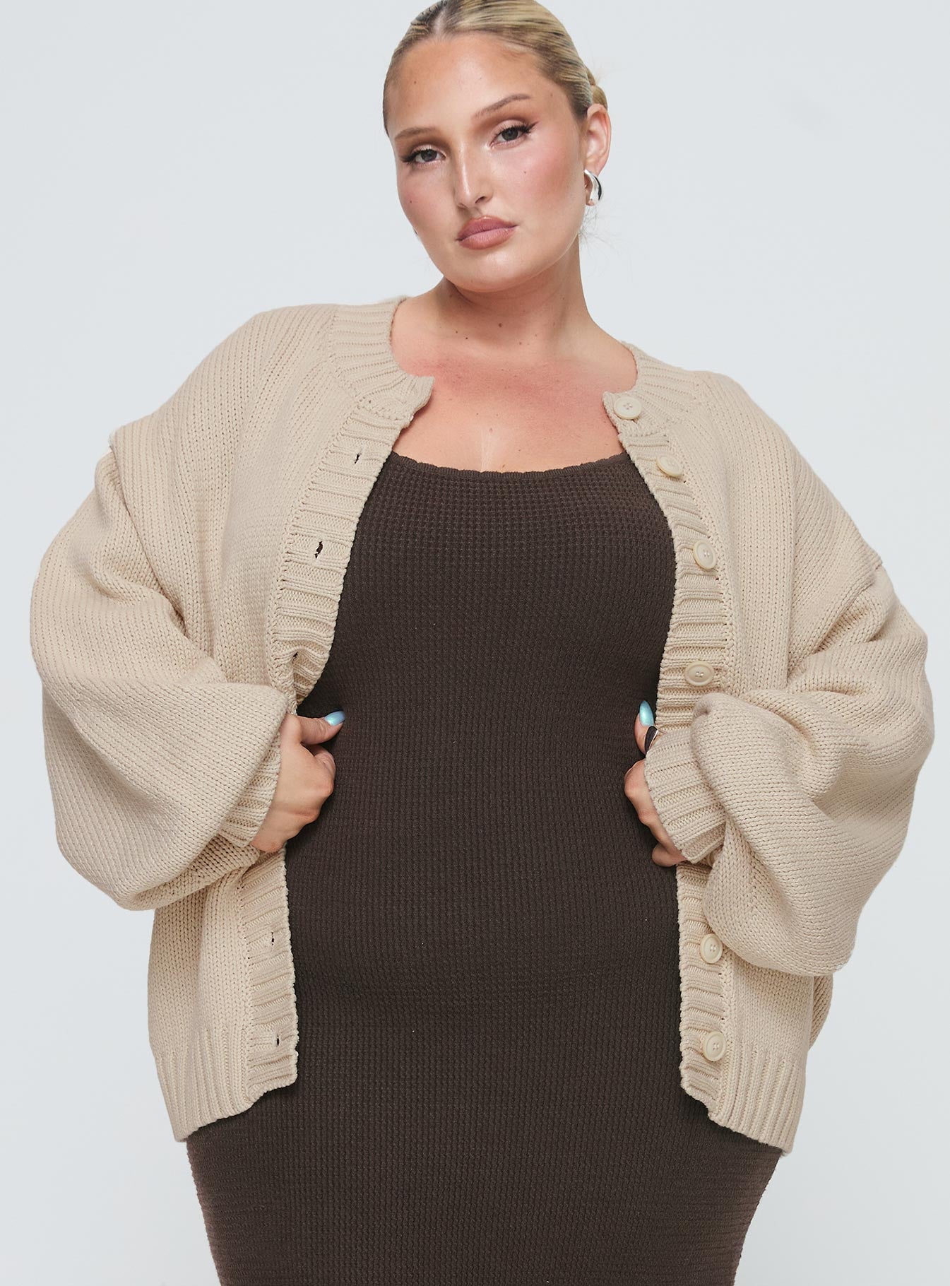 front view of model wearing Princess Polly Edern Cardigan Cream Curve Long 