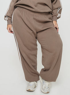 front view of model wearing Princess Polly Princess Polly Track Pants Stripe Taupe / White Curve 