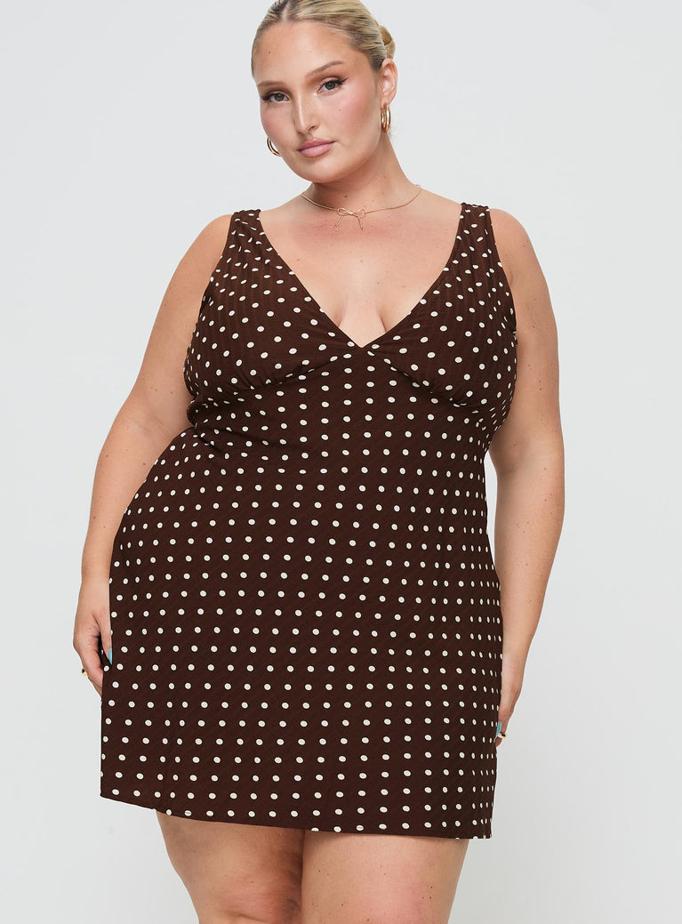 front view of model wearing Princess Polly Nellie Mini Dress Brown Polka Dot Curve Plunger 