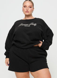 front view of model wearing Princess Polly Princess Polly Track Shorts Cursive Text Black Sand Curve High Waisted Shorts 