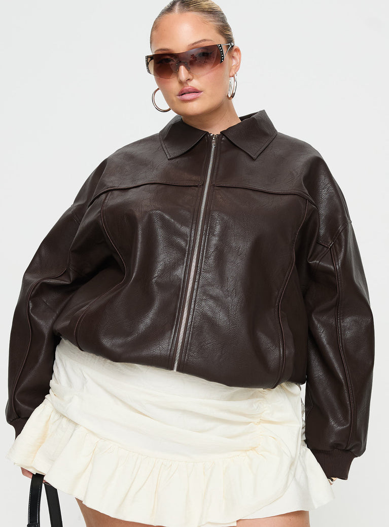 Brown Bomber jacket Oversized fit, faux leather material, classic collar, zip front fastening, ribbed waistband and cuffs, twin hip pockets
