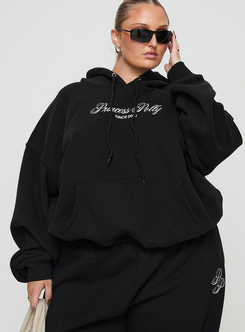 side view of model wearing Princess Polly Princess Polly Hooded Sweatshirt Script Black / Ivory Curve 
