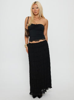   side view of model wearing Princess Polly Estefania Maxi Skirt Black Maxi 