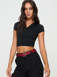 bLACK Top Cropped fit, short sleeves, v cut detail in neckline