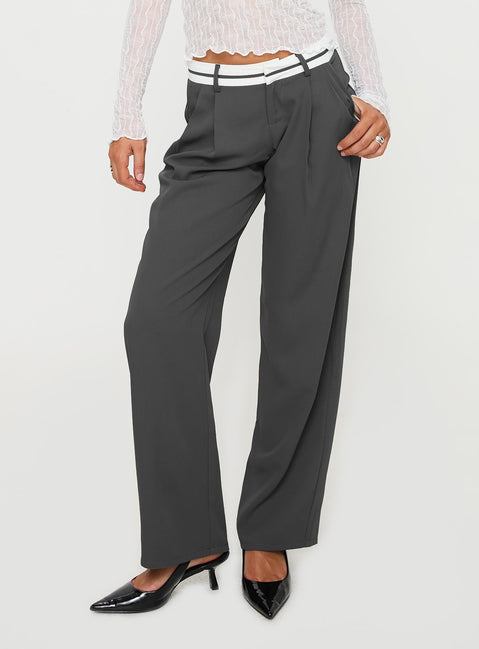 back view of model wearing Princess Polly Tennent Low Waist Pants Slate Mid Rise 