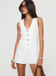 Romper Fixed shoulder straps, scooped neckline, button fastening down front Non-stretch material, unlined 