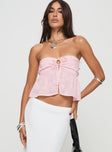 Strapless top Tie fastening at bust, shirred back panel, split hem Non-stretch material, lined bust