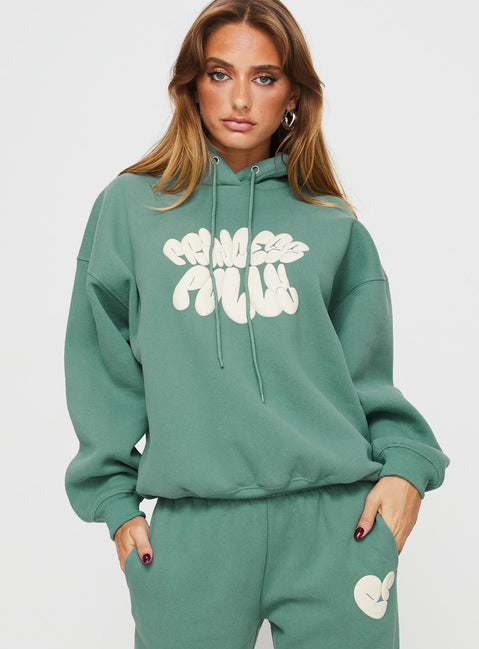 front view of model wearing Princess Polly Princess Polly Hooded Sweatshirt Bubble Text Sage / Eggshell regular 