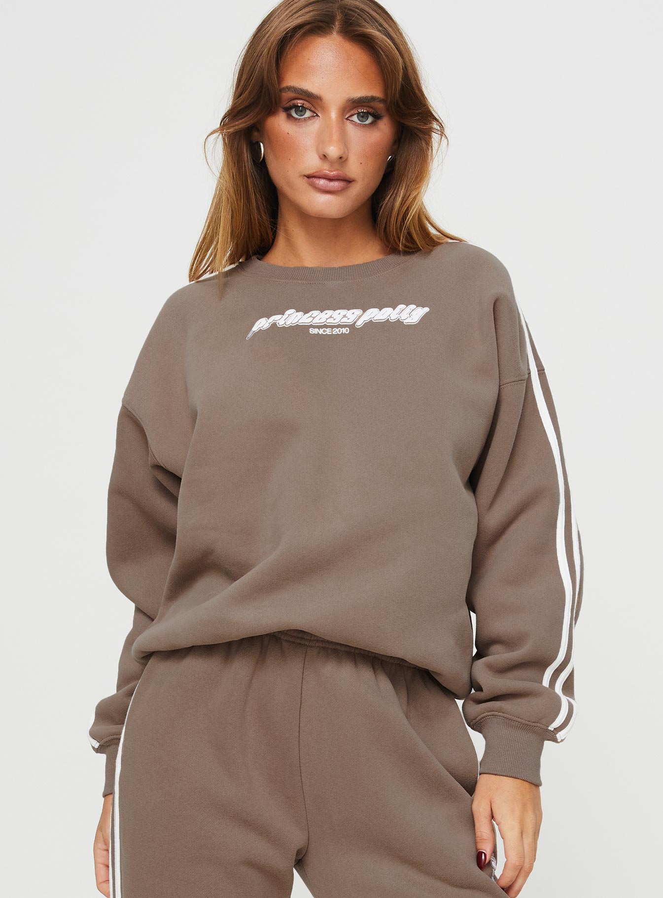 front view of model wearing Princess Polly Princess Polly Crew Neck Sweatshirt Stripe Taupe / White regular 