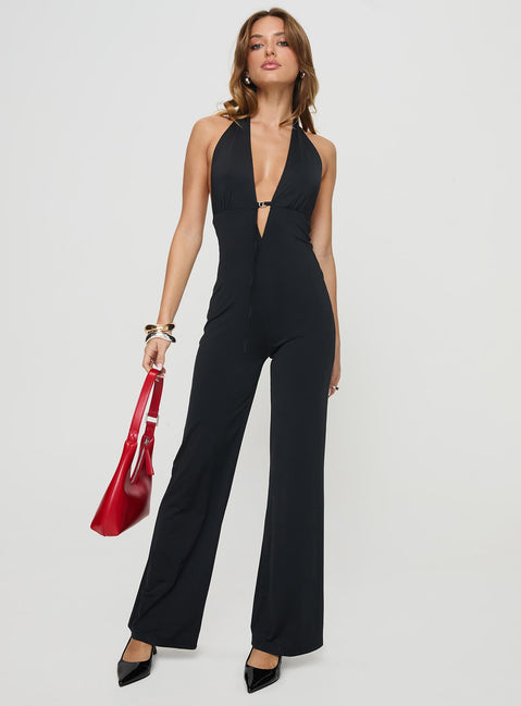 Jumpsuit Plunging neckline, halter style, silver-toned buckle detail at bust, straight leg fit Good stretch, unlined  Princess Polly Lower Impact 