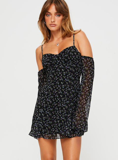 side view of model wearing Princess Polly Berrigan Mini Dress Black Sweetheart Neckline 