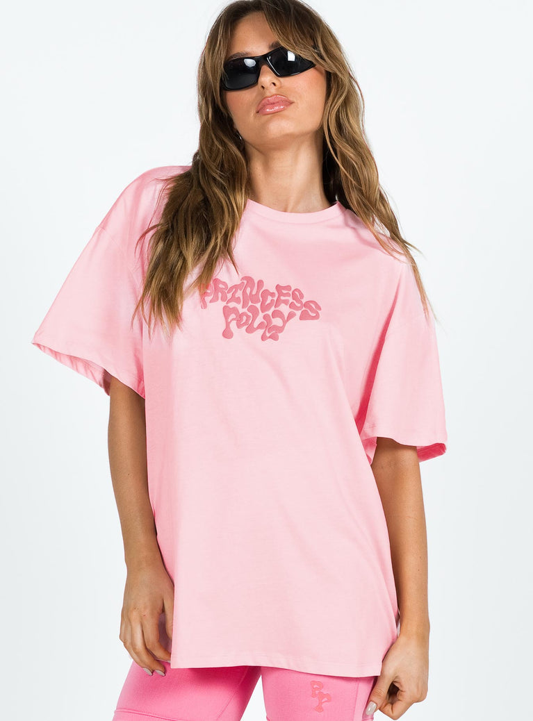 Front view of model wearing  front Princess Polly Half Sleeves Crew Neck  Princess Polly Oversized Tee Squiggle Text Pink