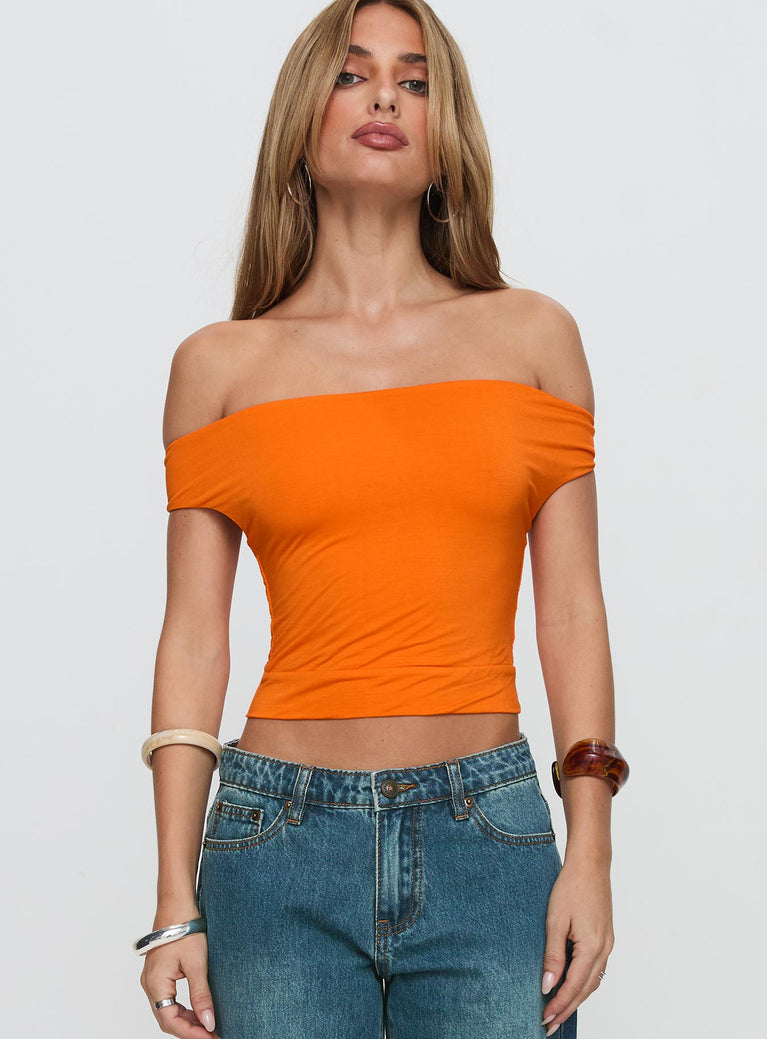 front view of model wearing Princess Polly Irina Multi-wear Top Orange Sleeveless Asymmetric Neckline 