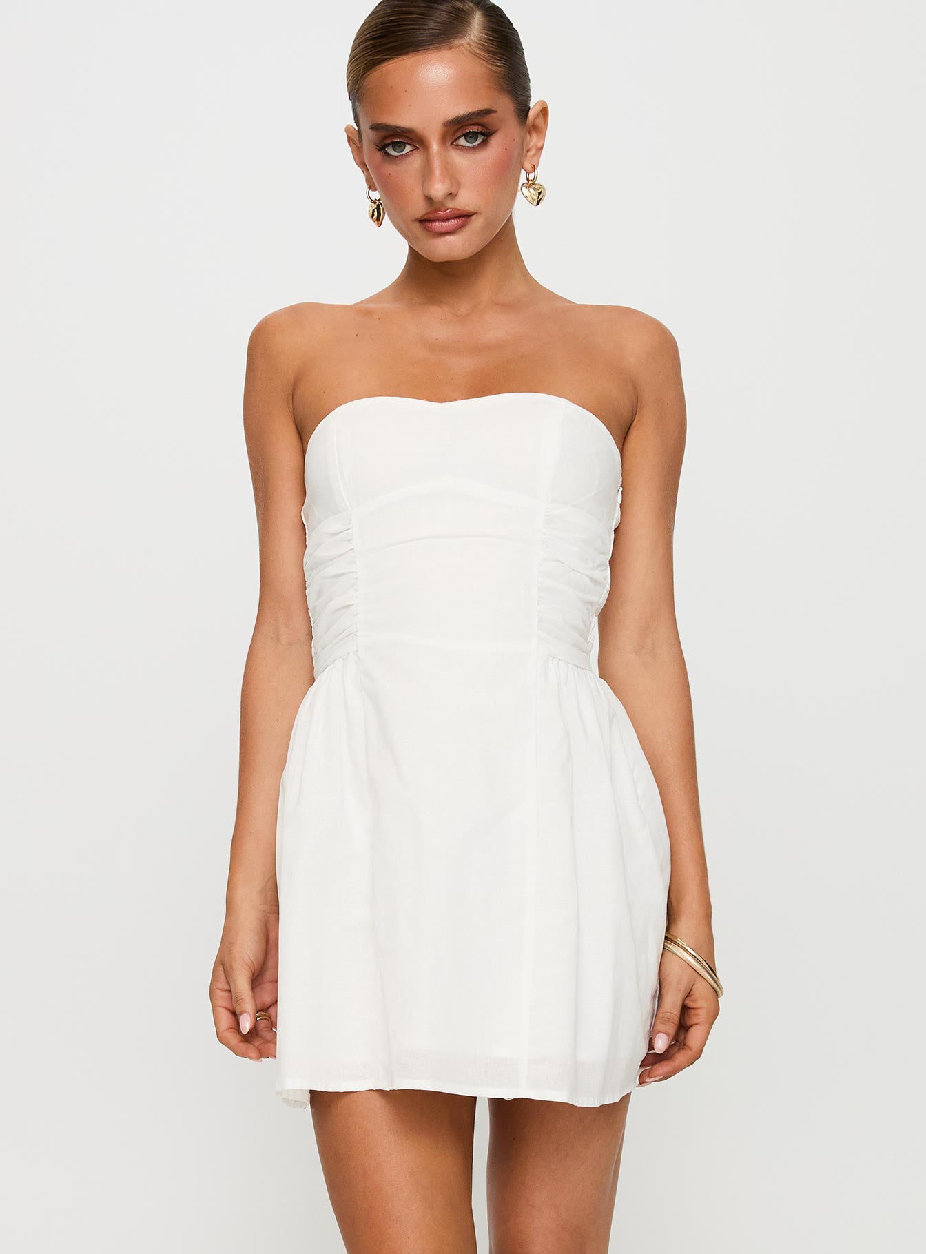 front view of model wearing Princess Polly Sybille Strapless Mini Dress White Sweetheart Neckline 