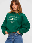 front view of model wearing Princess Polly Apres Ski Crew Neck Sweatshirt Green / Cream 