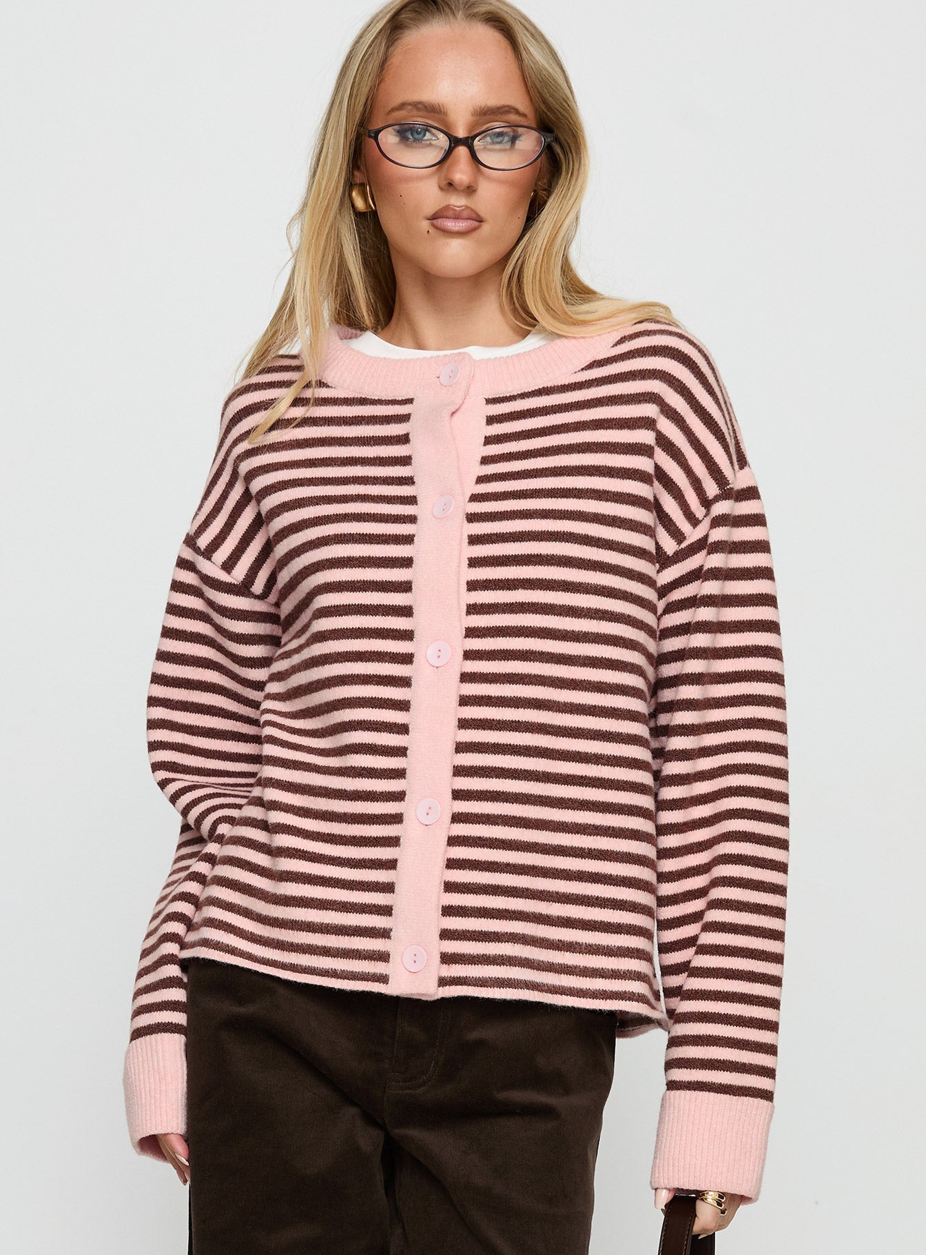 front view of model wearing Princess Polly Darnelle Button Up Knit Cardigan Pink Stripe Longline Jumpers 