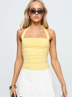 side view of model wearing Princess Polly By The Beach Halter Bodysuit Yellow Sleeveless 