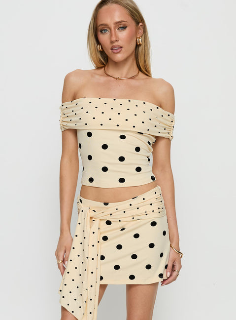   front view of model wearing Princess Polly Porzia Wrap Detail Mini Skirt Cream / Polka Dot Mini Skirts 