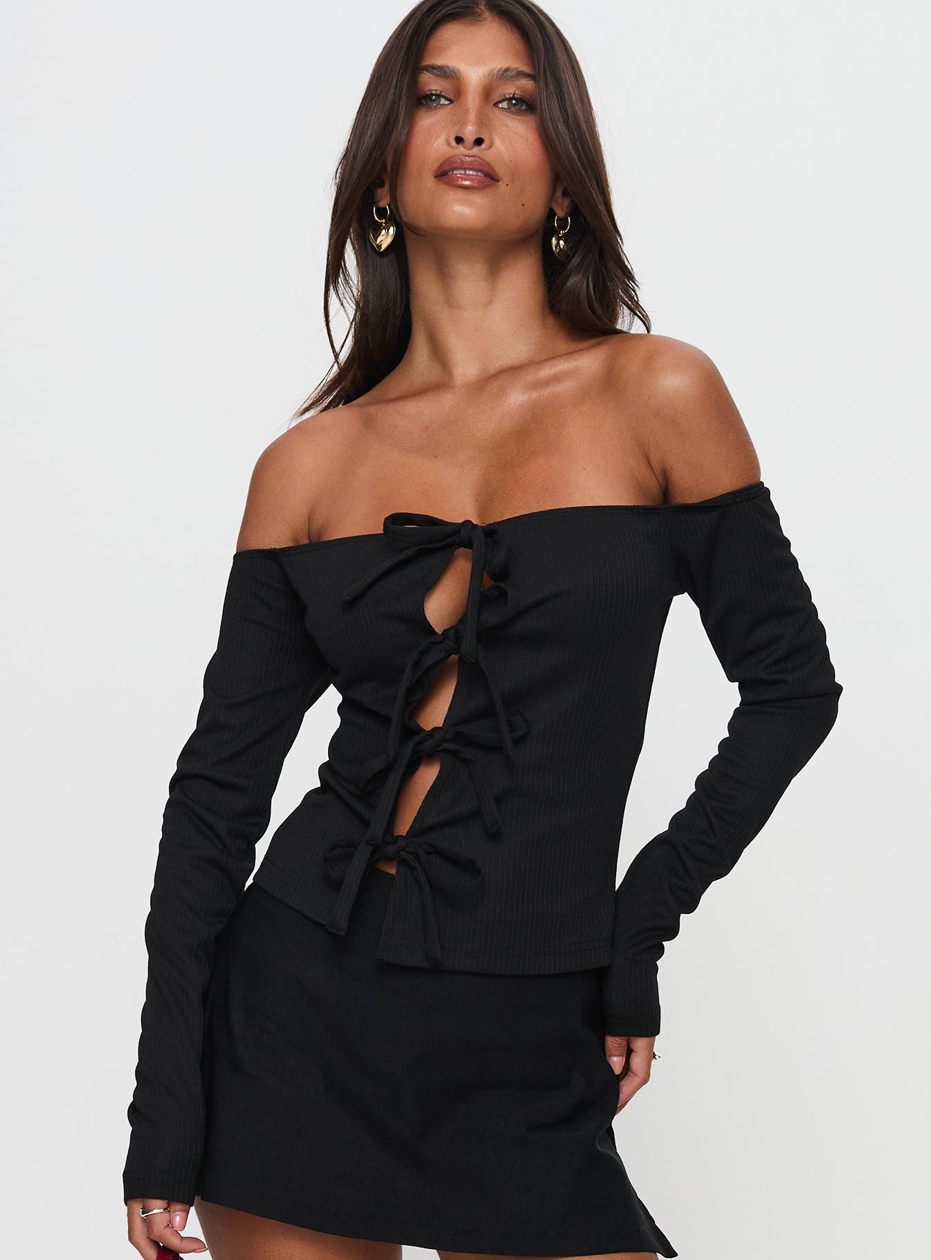 front view of model wearing Princess Polly Wish You The Best Off Shoulder Bow Detail Top Black Sleeveless straight 