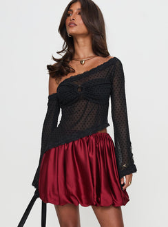   front view of model wearing Princess Polly Rubee Bubble Hem Mini Skirt Red Mini Skirts 