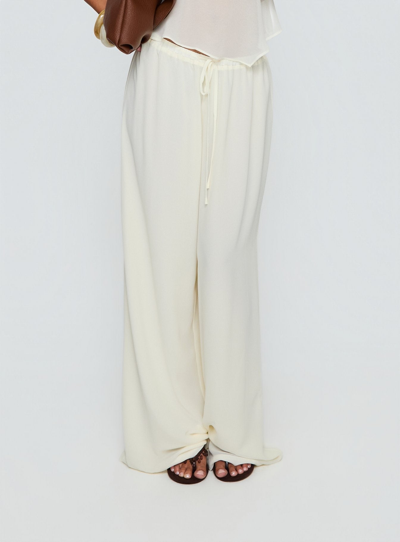 back view of model wearing Princess Polly Finesse Pants Yellow High Rise Pants 