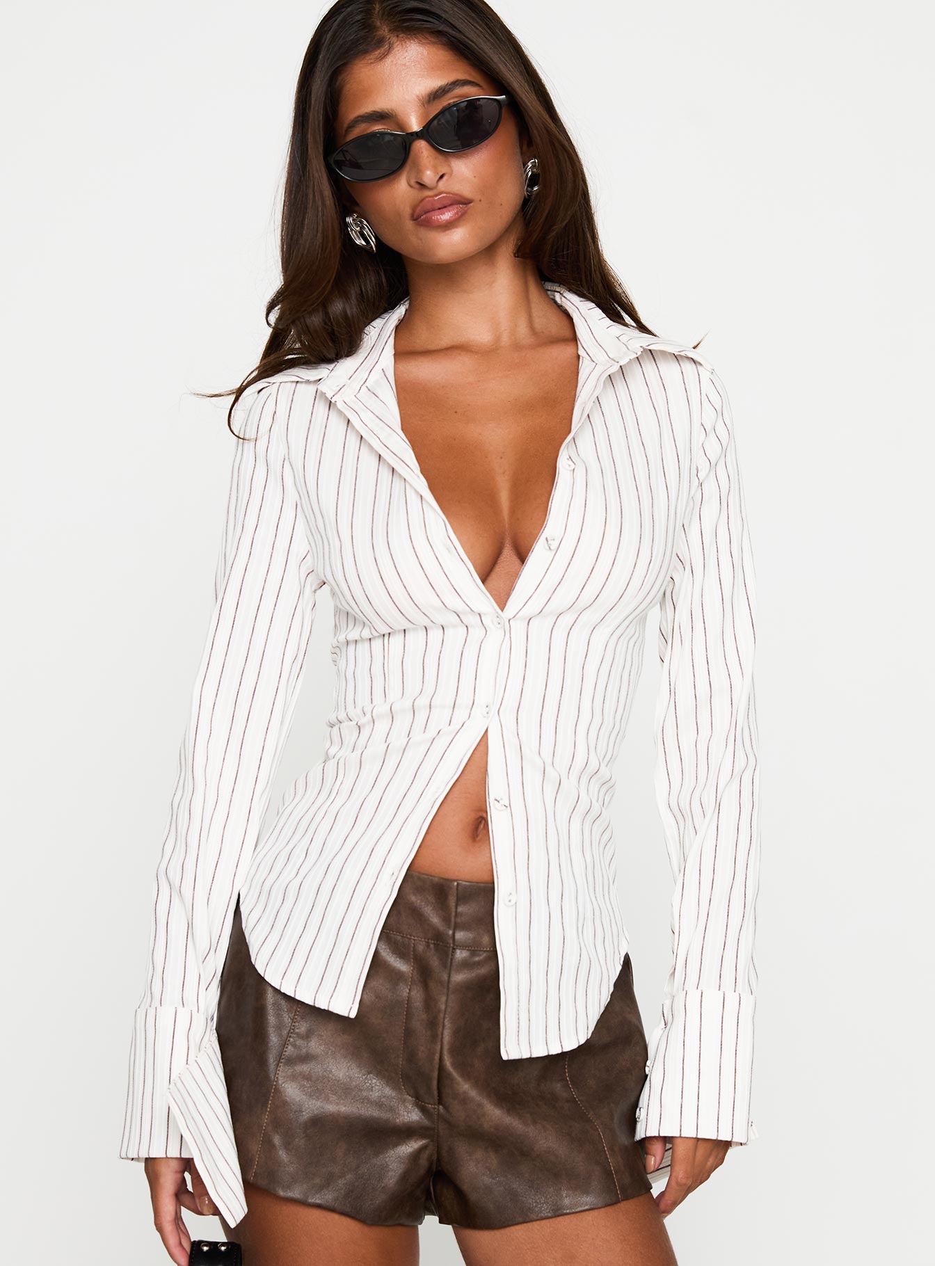 front view of model wearing Princess Polly Madlin Long Sleeve Top Beige Stripe Full Sleeves V-Neck 