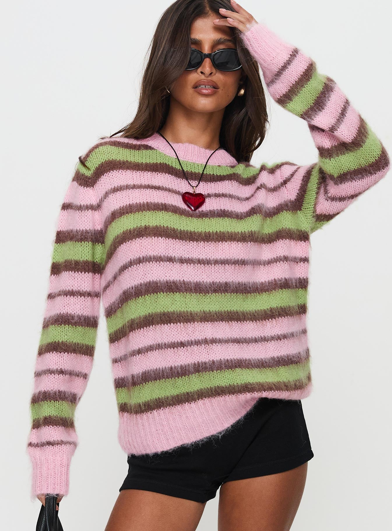 front view of model wearing Princess Polly Maysie Crew Neck Knit Sweater Green / Pink Long 