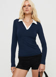 front view of model wearing Princess Polly Challenger Long Sleeve Top Navy Full Sleeves V-Neck 