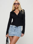   side view of model wearing Princess Polly Pacific Coast Denim Cargo Skirt Light Wash Mini Skirts 