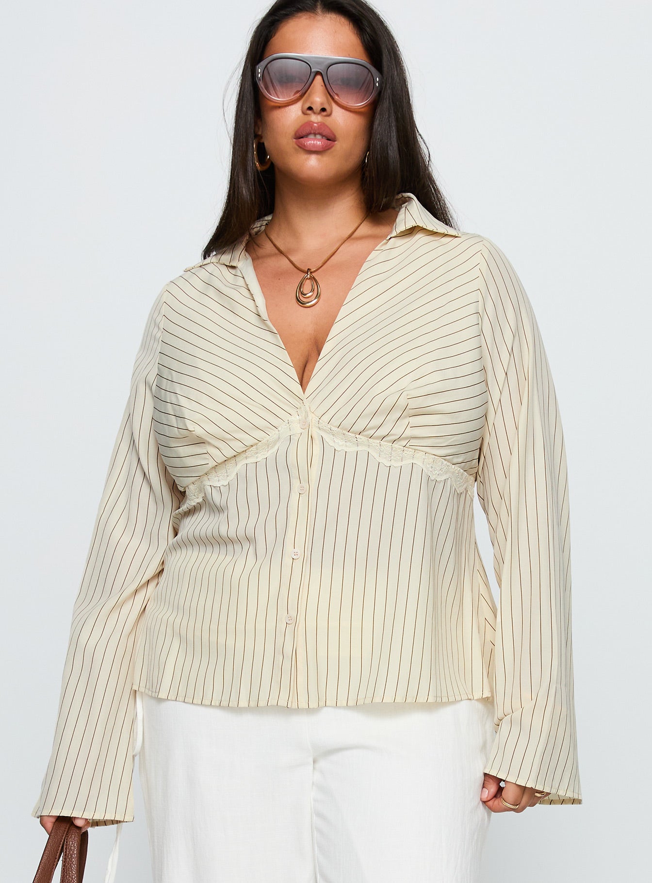 front view of model wearing Princess Polly Life Begins Long Sleeve Lace Trim Top Cream Stripe Curve Full Sleeves Plunger 