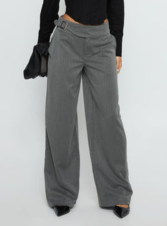 side view of model wearing Princess Polly Jinny Relaxed Buckle Tailored Pants Grey Pinstripe Low Rise Pants 