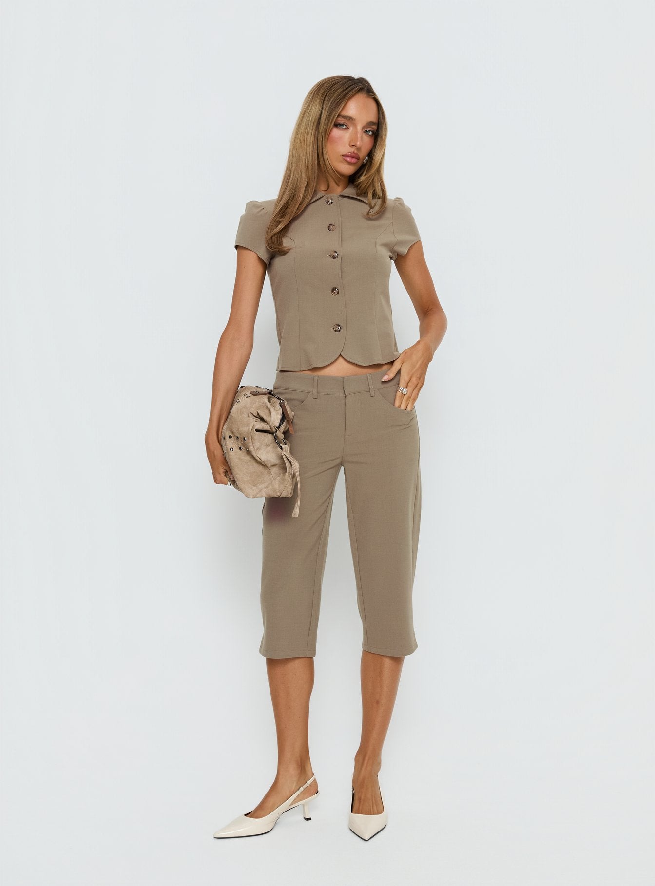 front view of model wearing Princess Polly Tunian Capri Tailored Pants Taupe Mid Rise Pants 