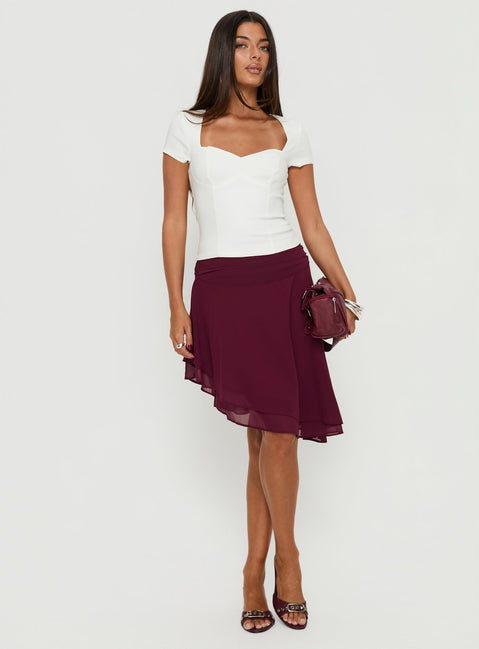   front view of model wearing Princess Polly Evanescence Asymmetrical Midi Skirt Cherry 