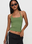 side view of model wearing Princess Polly Ezekiel Nylon Top Green Sleeveless Square Neck 